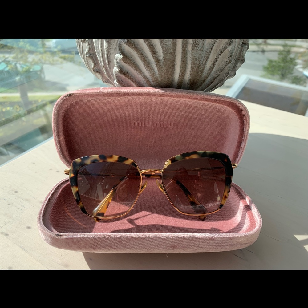 Miu Miu tortoise cat eye sunglasses
